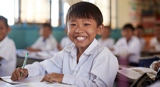 young boy smiling in Siem Reap, Cambodia