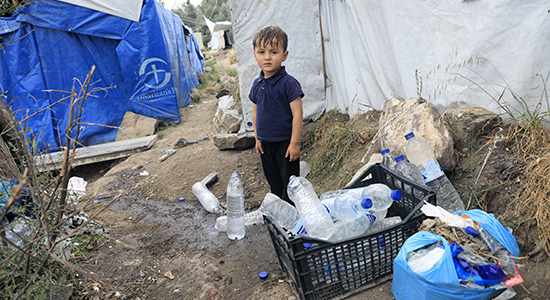 Young refugee boy in Greece