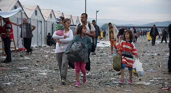 Refugee family in a camp near Greece